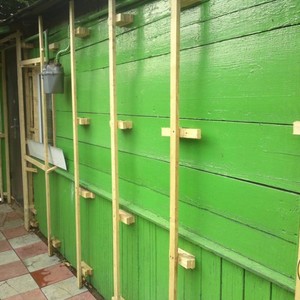 Отделка фасада сайдингом Docke Корабельный брус светло-зеленый