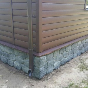 Отделка фасада сайдингом Блок Хаус FineBer Могано