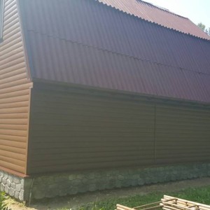 Отделка фасада сайдингом Блок Хаус FineBer Могано