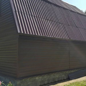 Отделка фасада сайдингом Блок Хаус FineBer Могано