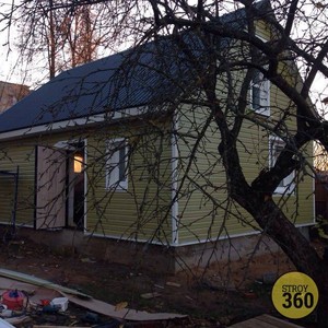 Отделка фасада панелями Альта-Профиль Канада Плюс Премиум Оливковый