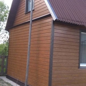 Отделка фасада панелями Vox Max 3 дуб золотой 60 м²