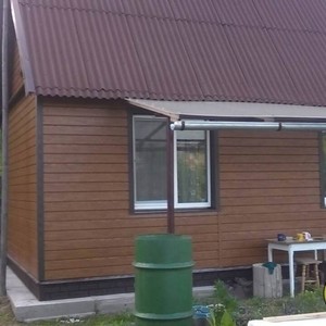 Отделка фасада панелями Vox Max 3 дуб золотой 60 м²