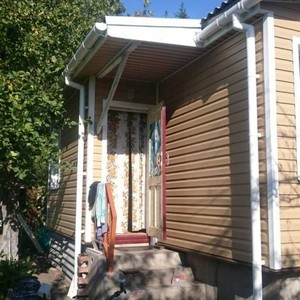 Отделка фасада 80 м2 сайдингом Блок Хаус (Blockhouse) Docke Карамель