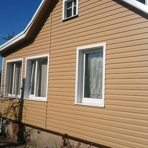 Отделка фасада 80 м2 сайдингом Блок Хаус (Blockhouse) Docke Карамель
