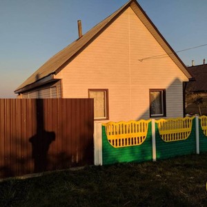 Отделка фасада сайдингом Тимберблок Ясень белый
