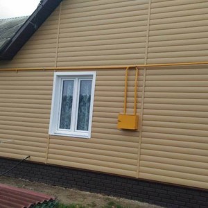 Отделка фасада 140 м2 сайдингом Блок Хаус (Blockhouse) Docke Карамель