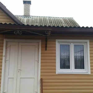 Отделка фасада 140 м2 сайдингом Блок Хаус (Blockhouse) Docke Карамель
