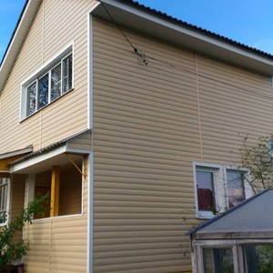 Отделка фасада 125м2 сайдингом Блок Хаус (Blockhouse) Docke Карамель